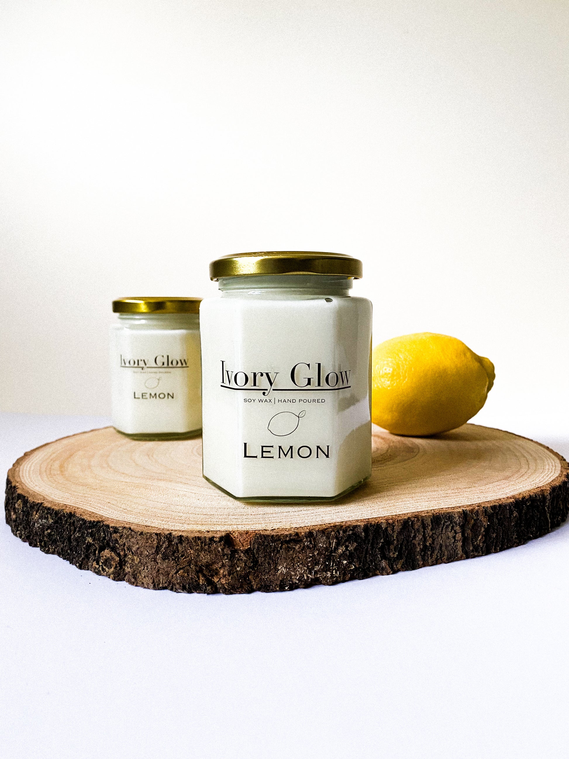 Elegant luxury lemon candle with a sleek design. Hand-poured in a glass jar, this candle combines zesty lemon fragrance with a subtle hint of sophistication. Perfect for creating a fresh and luxurious ambiance in any space.