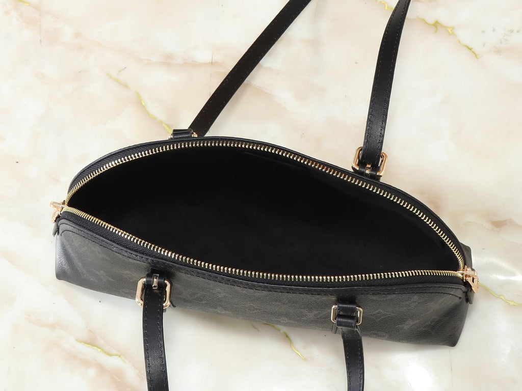 Louis Vuitton Squire East West Monogram Handbag — detail