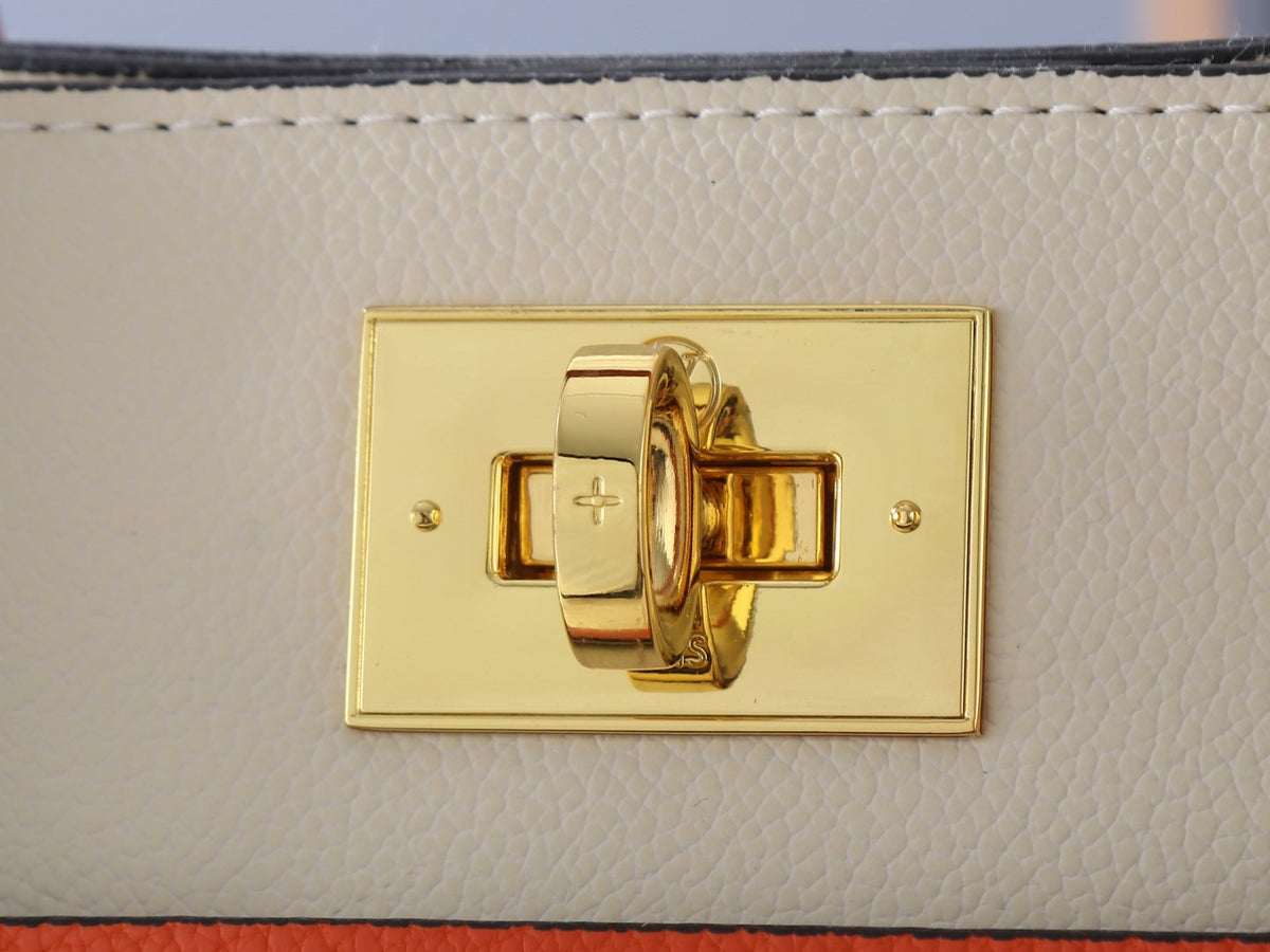 Louis Vuitton On My Side Turn-Lock Tote — detail