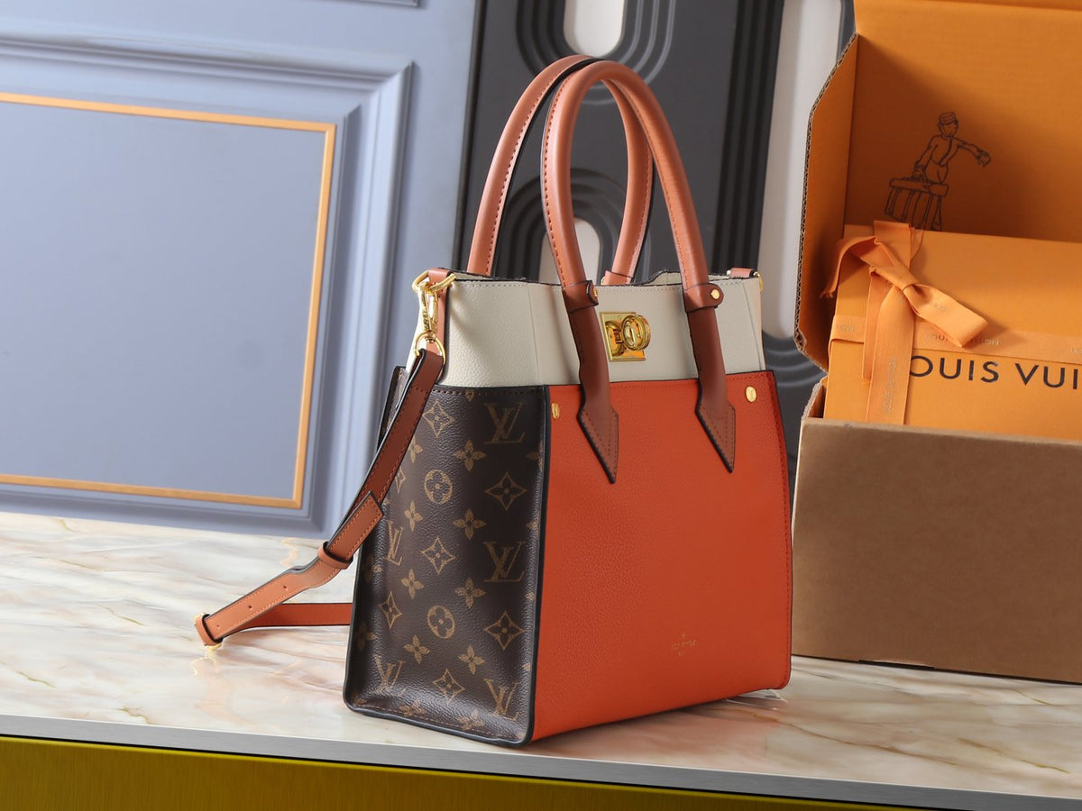 Louis Vuitton On My Side Turn-Lock Tote — side