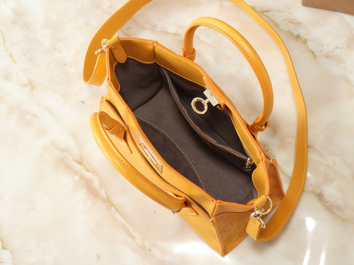 Louis Vuitton On My Side Turn-Lock Tote — detail