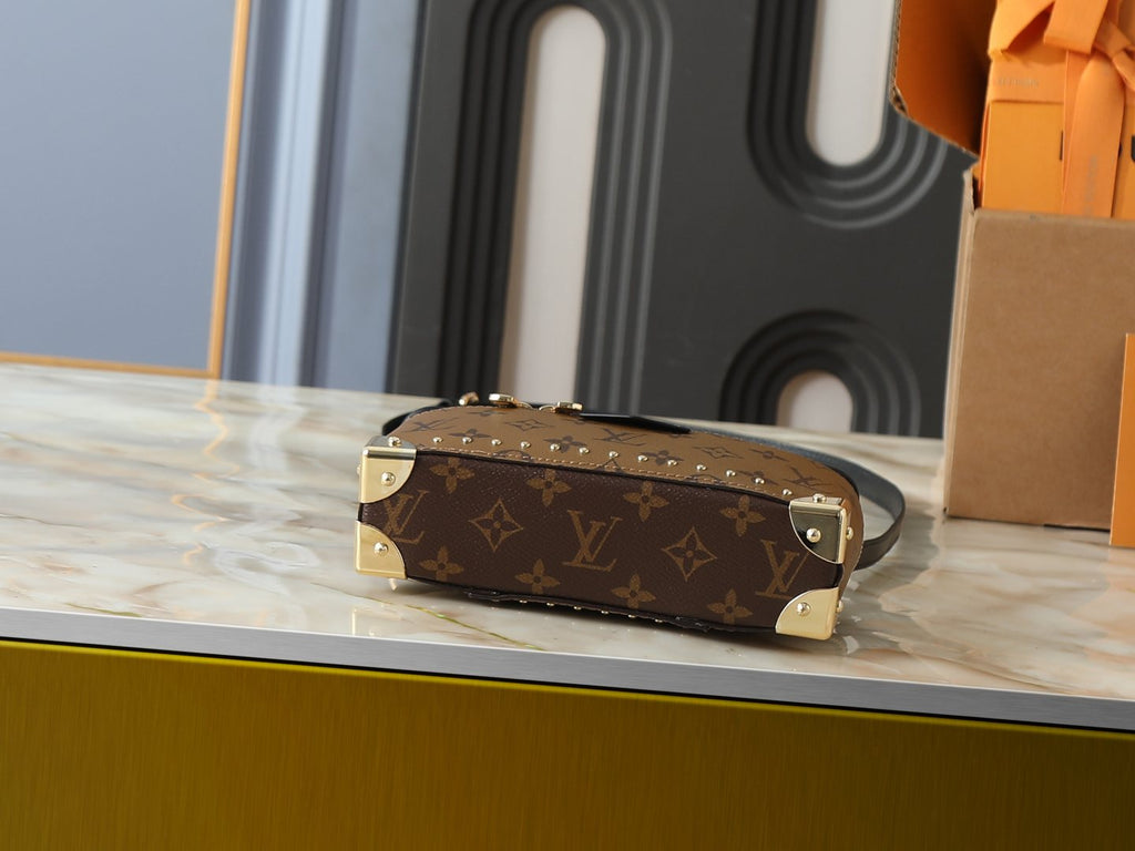 Louis Vuitton Vanity Pouch Monogram Trunk Handbag — detail