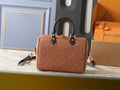 Louis Vuitton Speedy Bandoulière Embossed Suede Handbag — hero