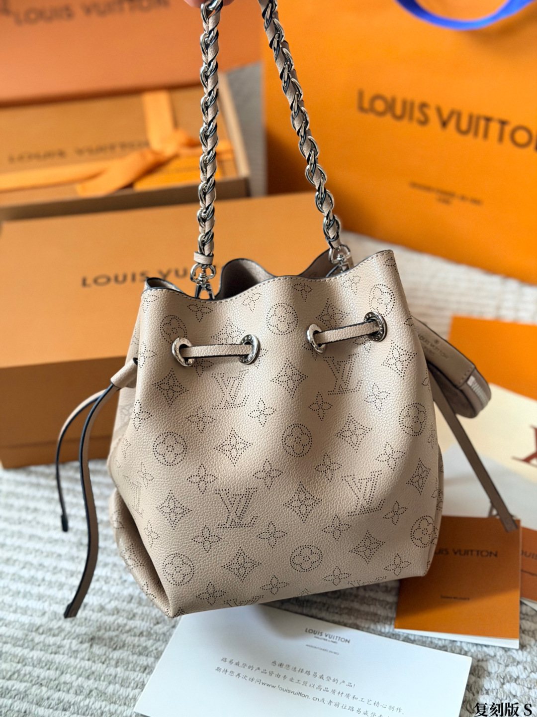Louis Vuitton Bella Perforated Monogram Bucket Bag — front