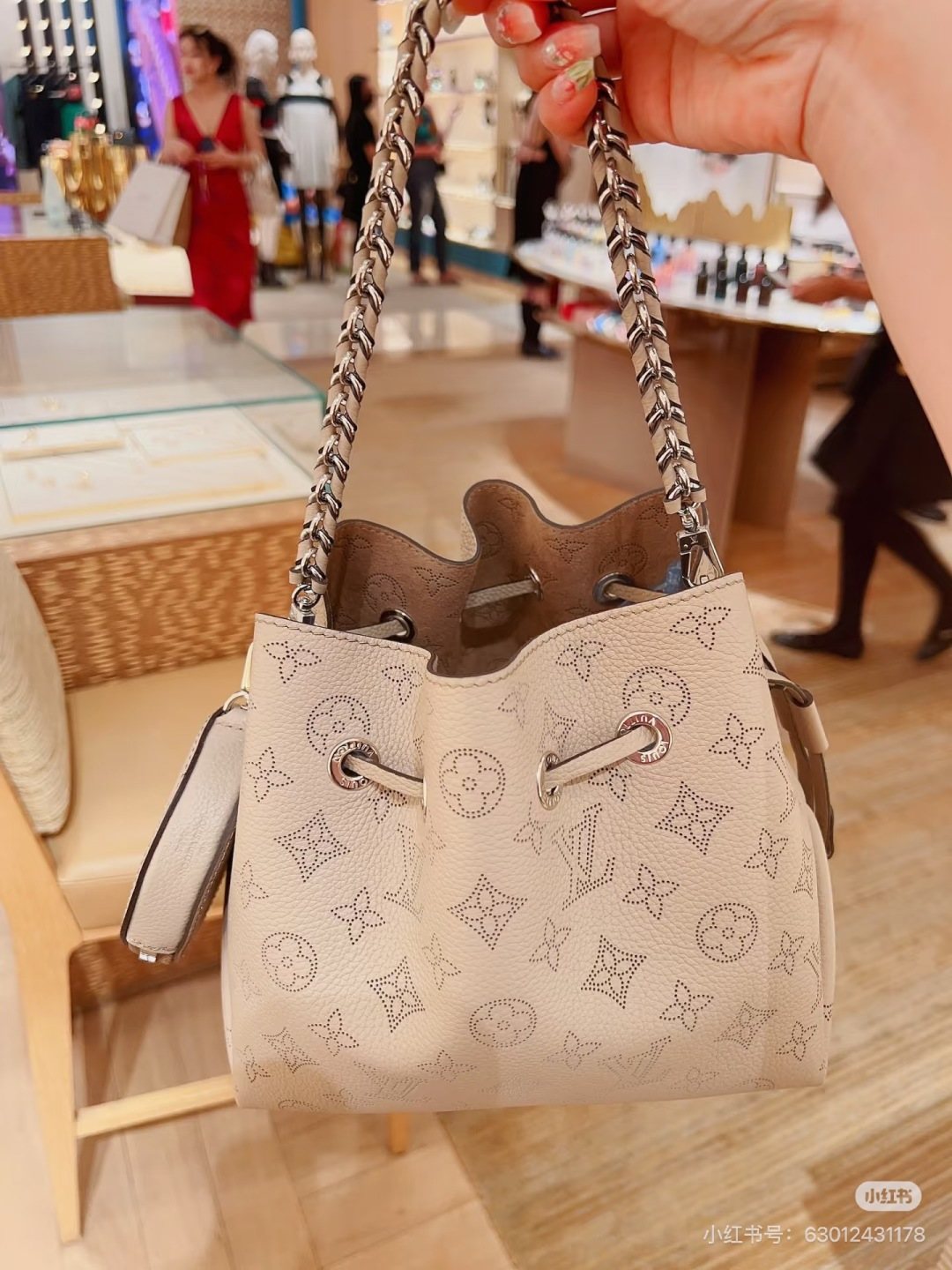 Louis Vuitton Bella Perforated Monogram Bucket Bag — front