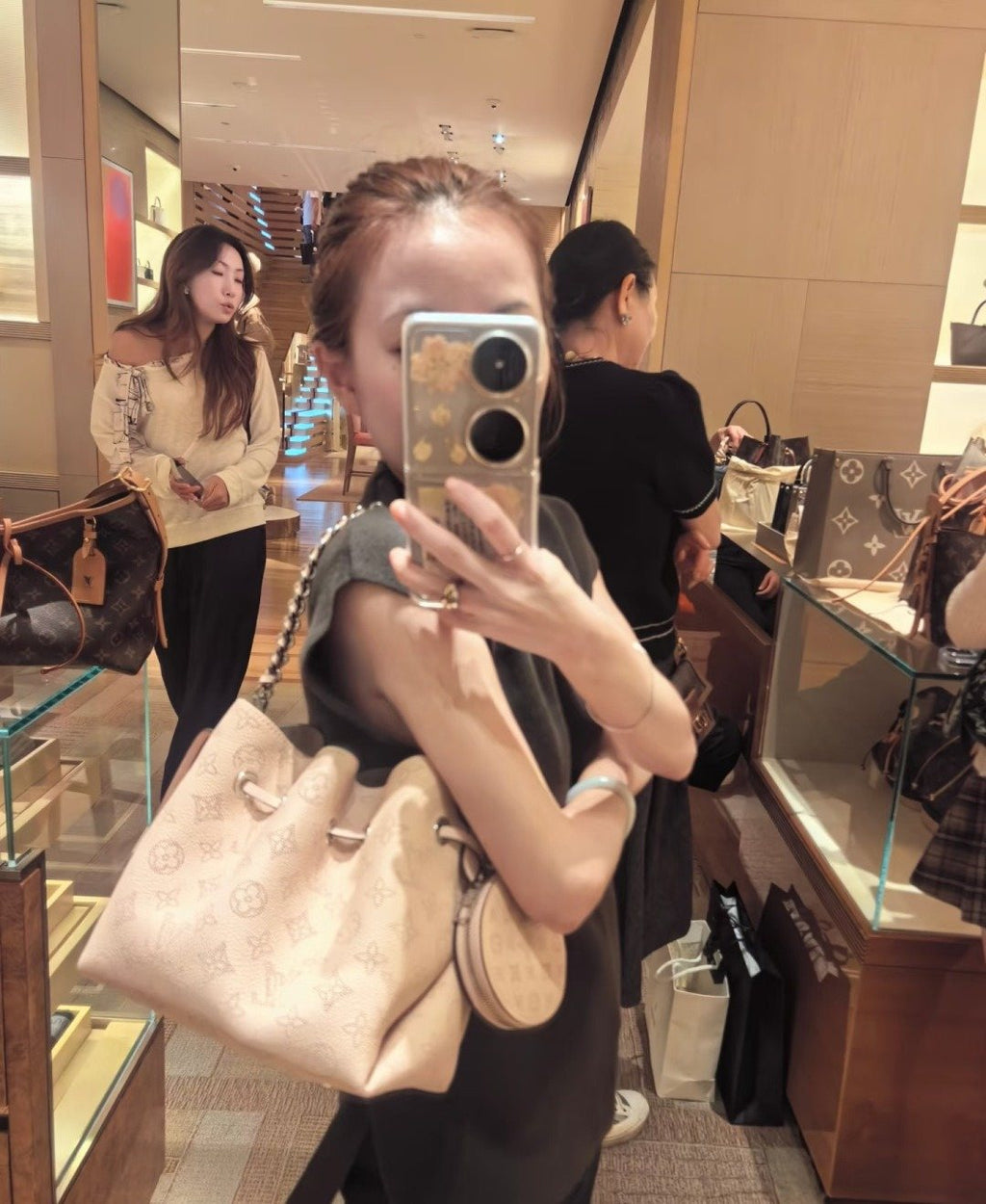 Louis Vuitton Bella Perforated Monogram Bucket Bag — model