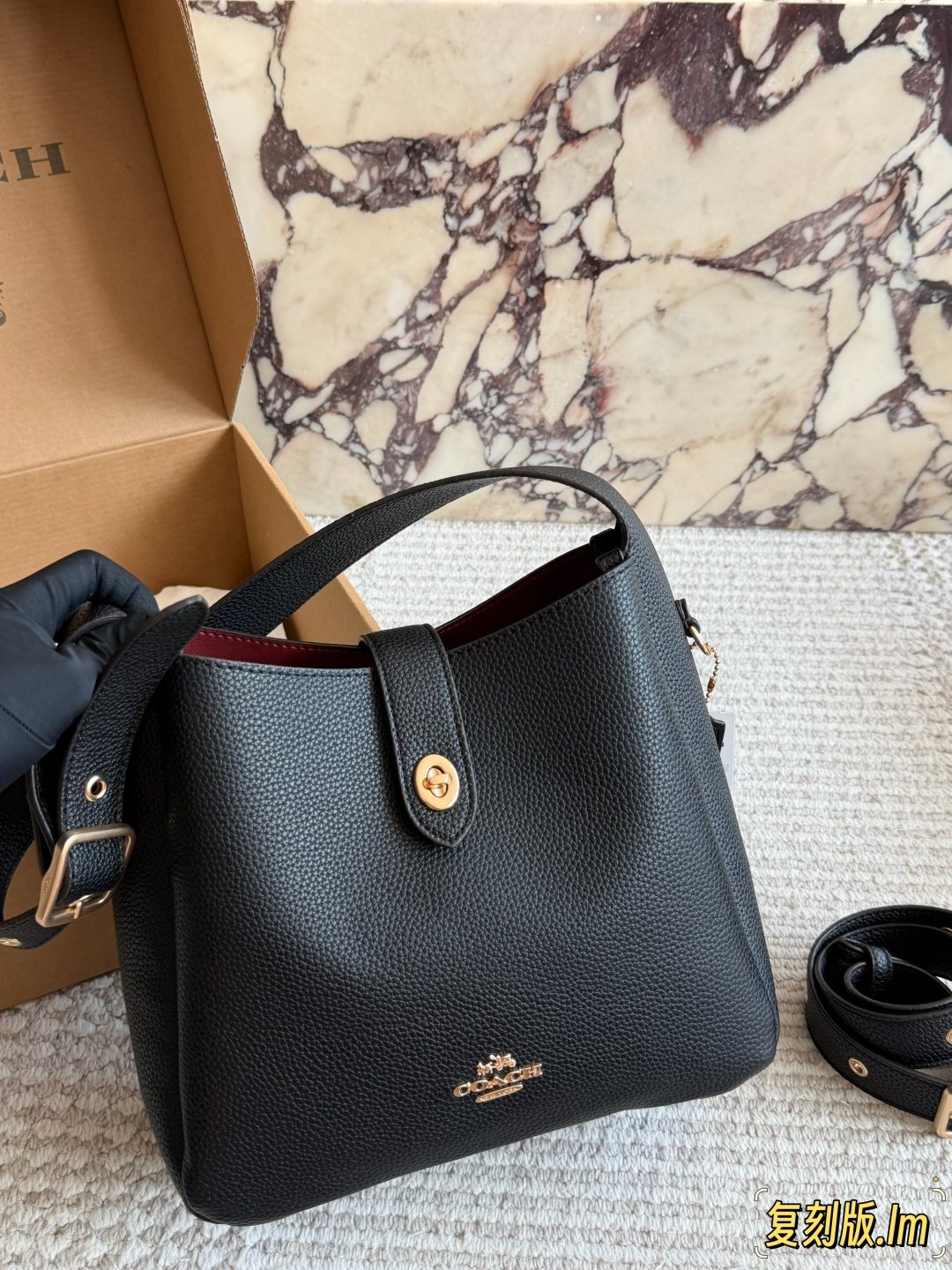 Coach Rounded-Tab Bucket Bag — front