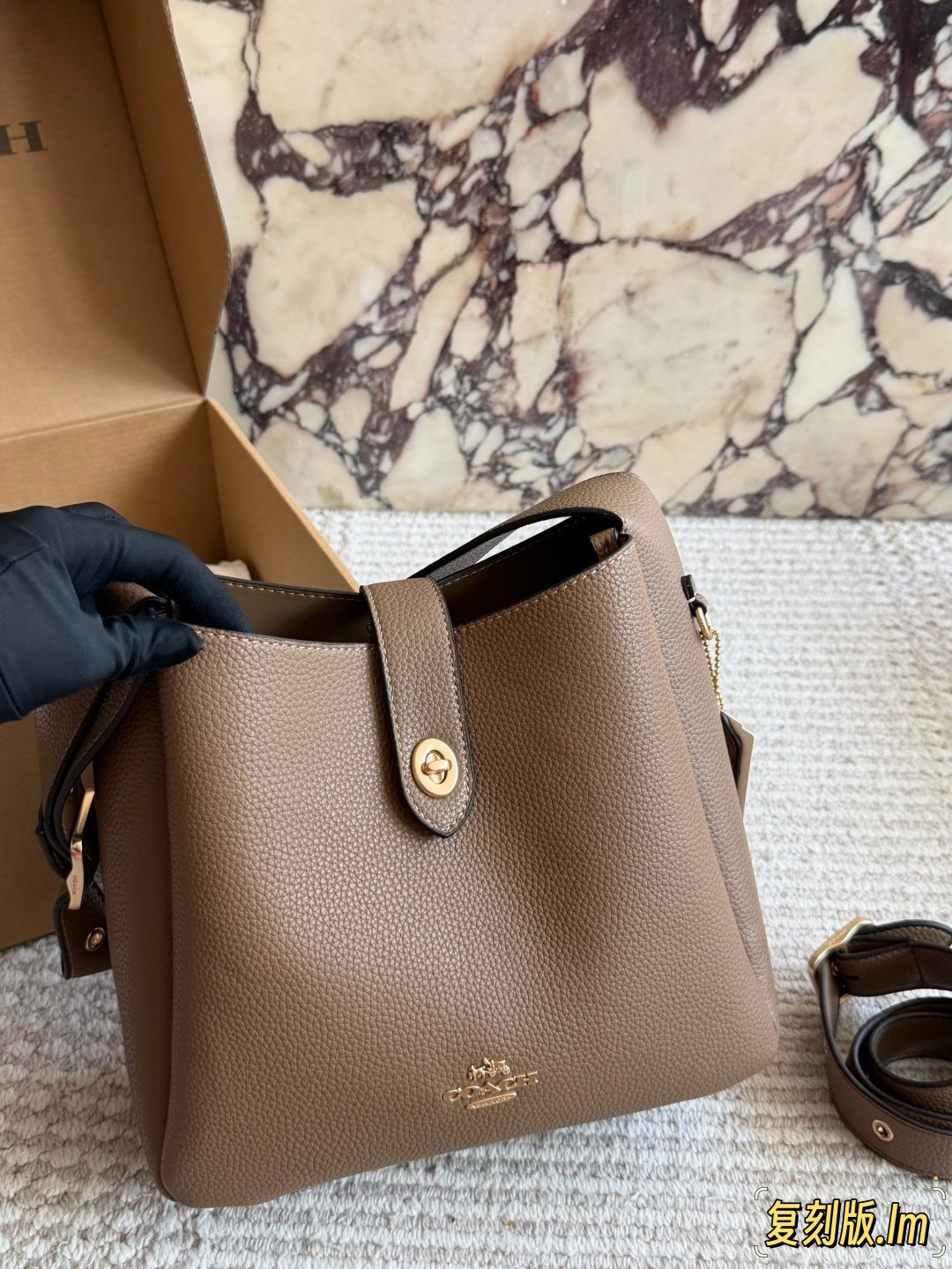 Coach Rounded-Tab Bucket Bag — front