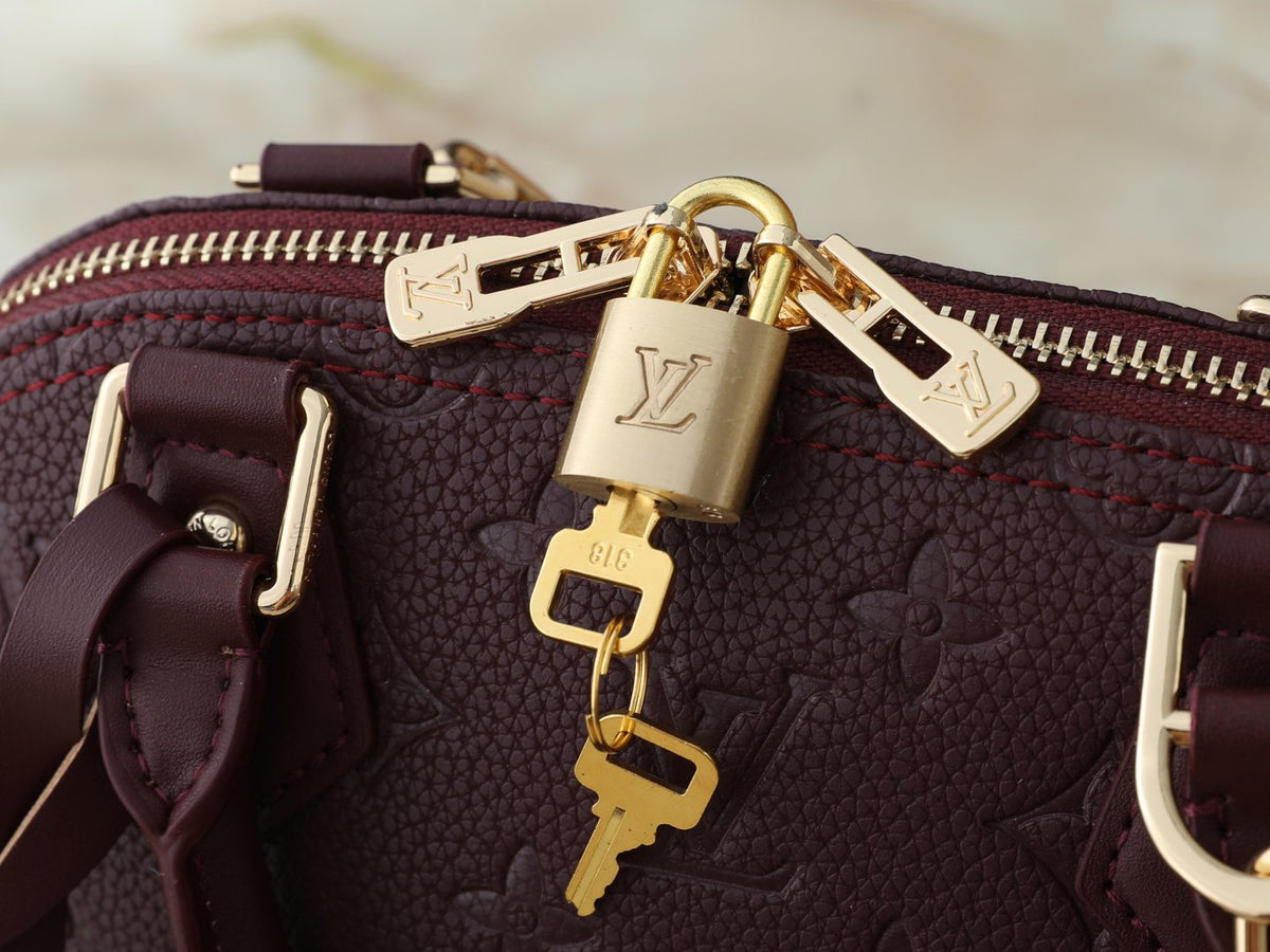 Louis Vuitton Alma BB Monogram Empreinte Bag — detail