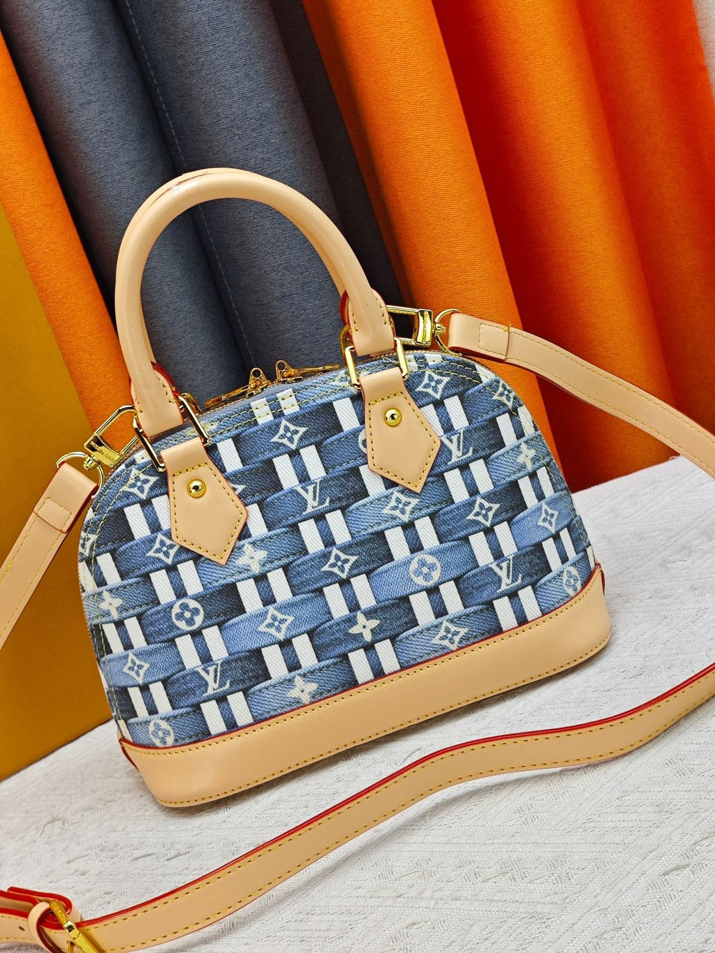 Louis Vuitton Alma BB Domed Top-Handle Bag — front
