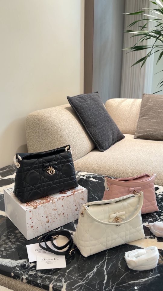 Dior Adiorable Top Handle Bow Bag — comparison