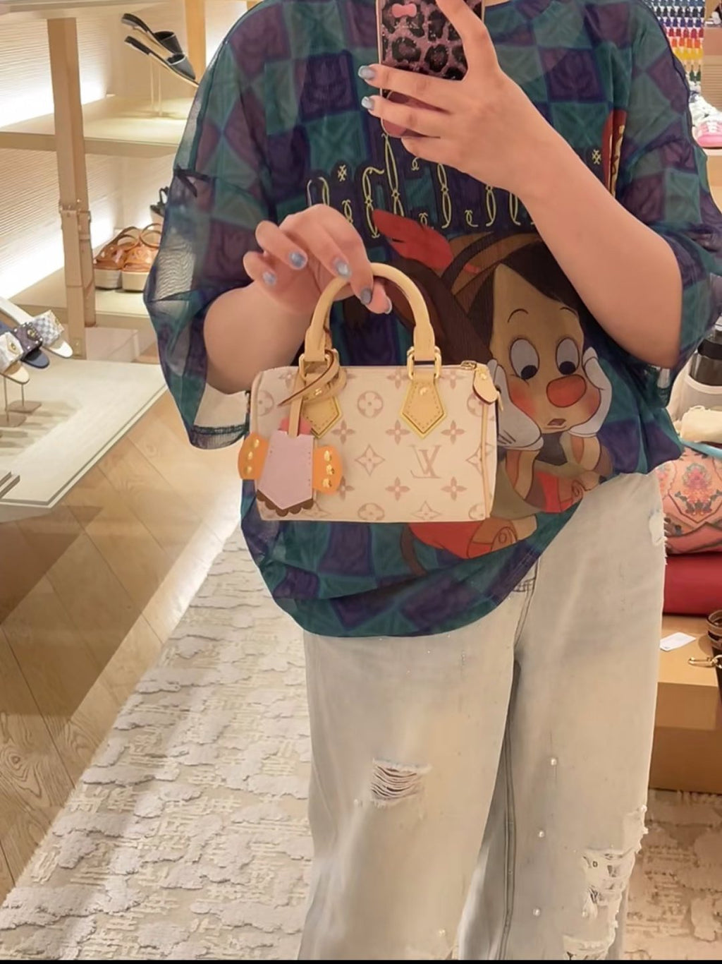 Louis Vuitton Nano Speedy Cream Monogram Bag — model