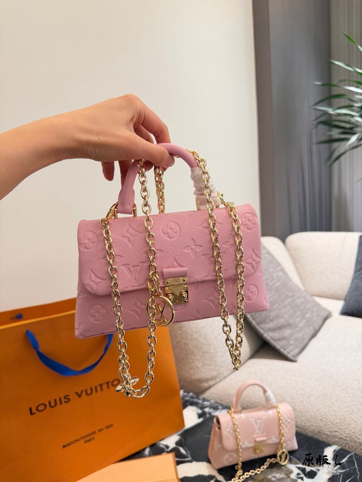 Louis Vuitton Madeleine Nano Top-Handle Flap Bag — model