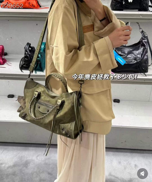 Balenciaga Le City Suede Handbag — model