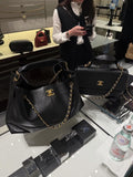 Chanel Quilted Hobo Bag with Draped Chain — hero