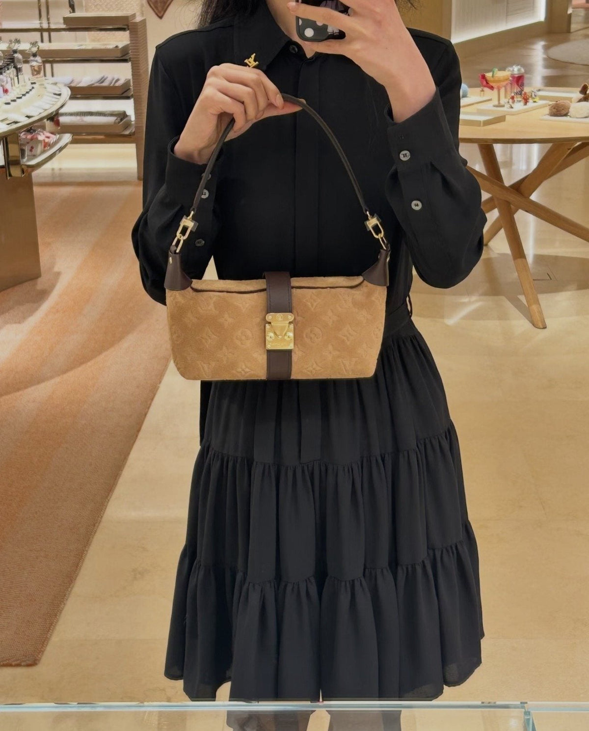 Louis Vuitton Mia Tan Shoulder Bag — model