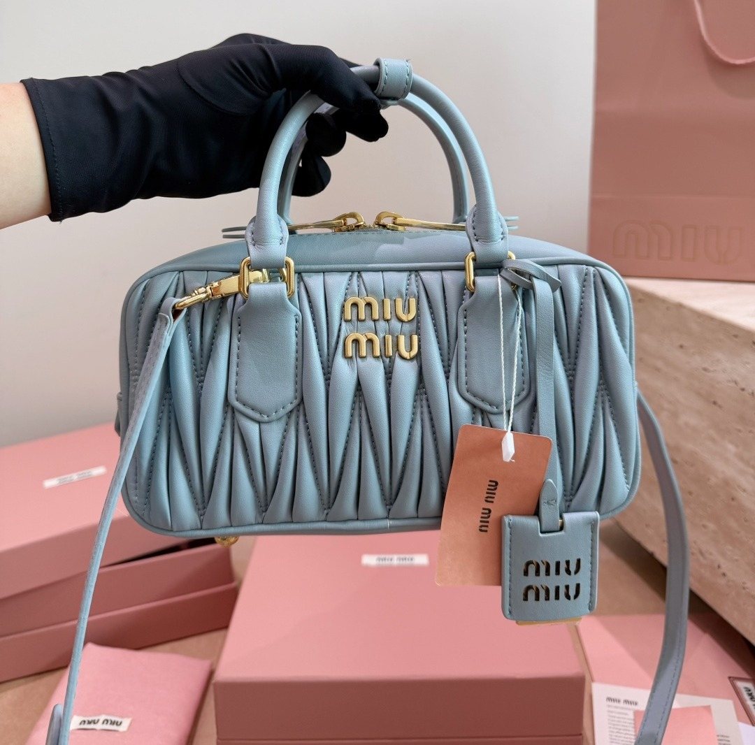Miu Miu Gathered Bowling Top-Handle Bag — model