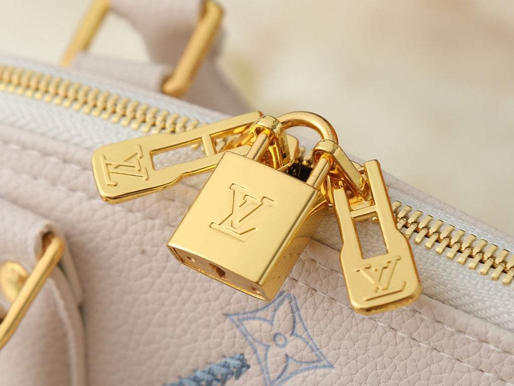 Louis Vuitton Alma BB Monogram Empreinte Couture Handbag — detail