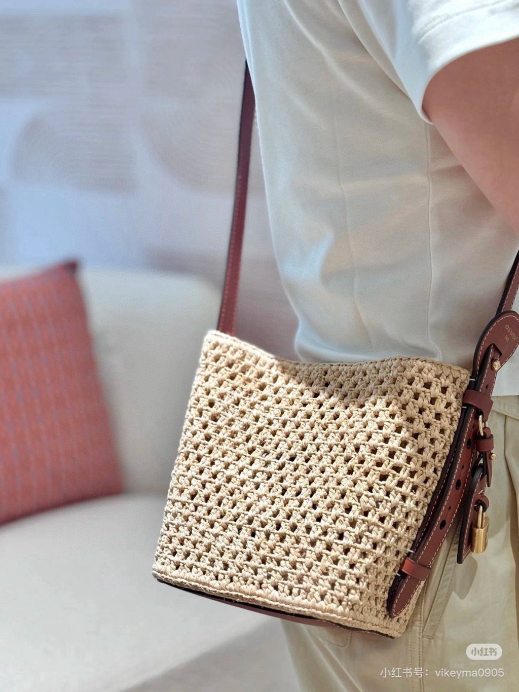 Louis Vuitton Woven Bucket Bag with Monogram Pouch — model