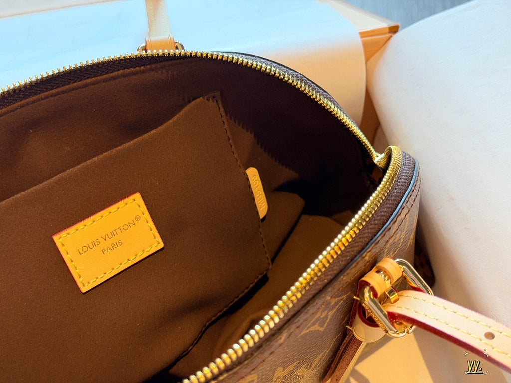 Louis Vuitton Squire East West Monogram Shoulder Bag — detail
