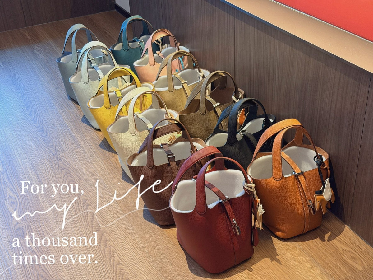 Hermès Curved-Panel Top-Handle Bucket Bag — comparison