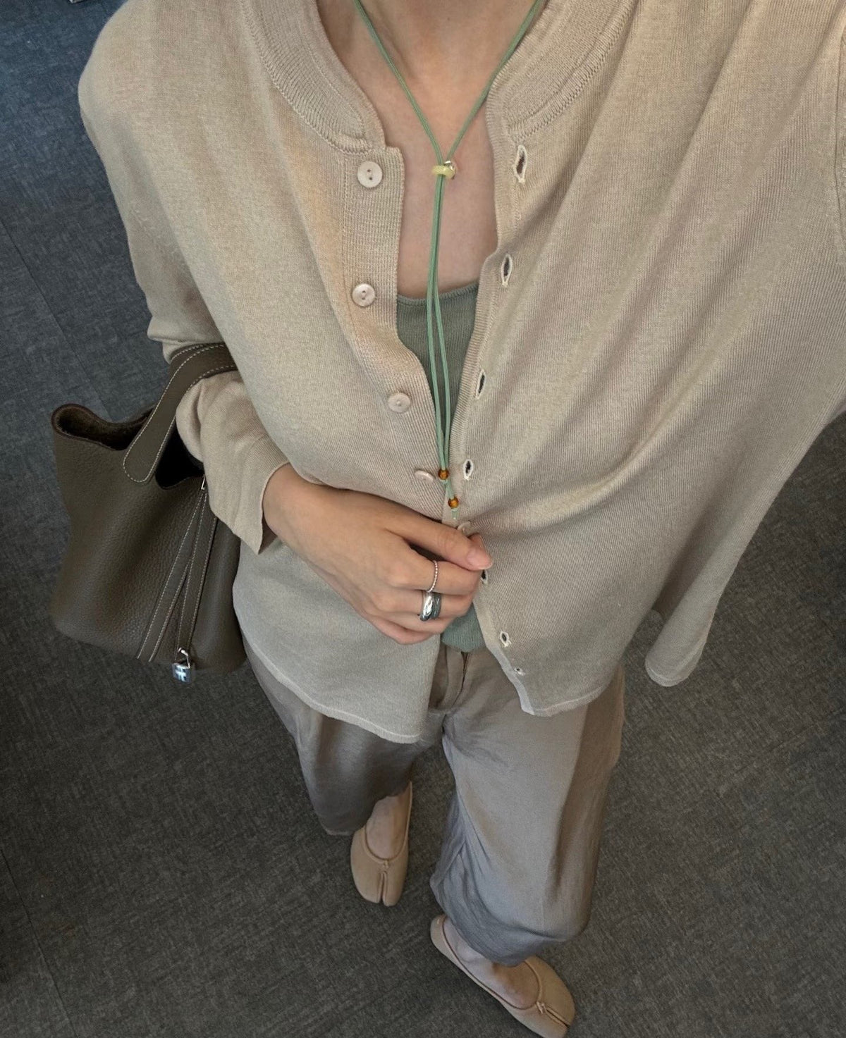 Hermès Curved-Panel Top-Handle Bucket Bag — model