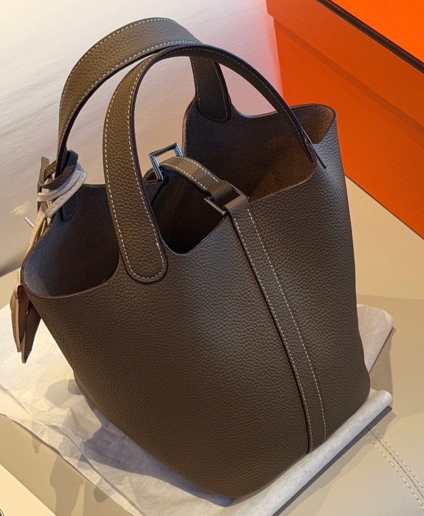 Hermès Curved-Panel Top-Handle Bucket Bag — front