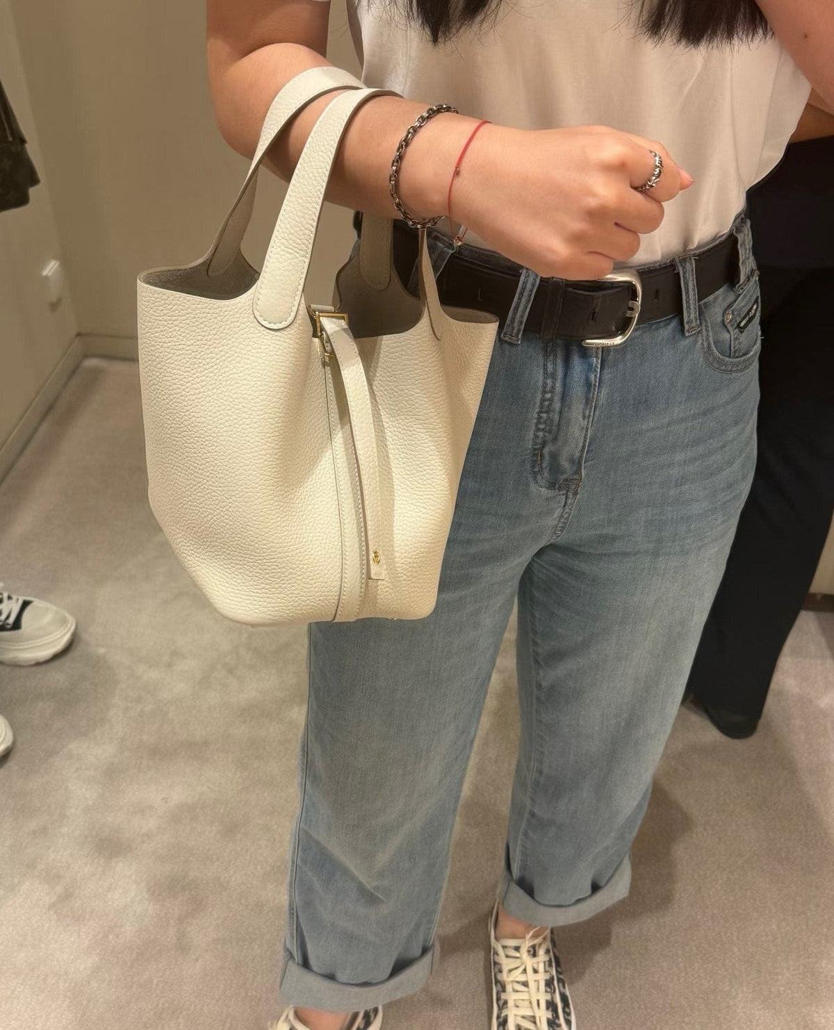 Hermès Curved-Panel Top-Handle Bucket Bag — model