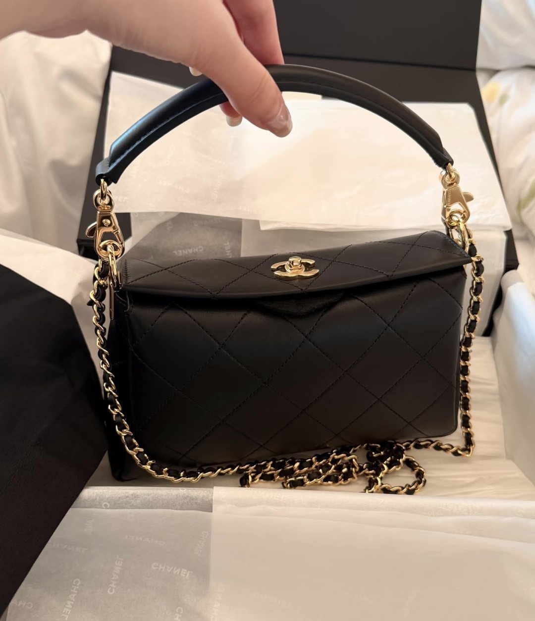 Chanel Quilted Curved-Flap Top-Handle Bag — hero