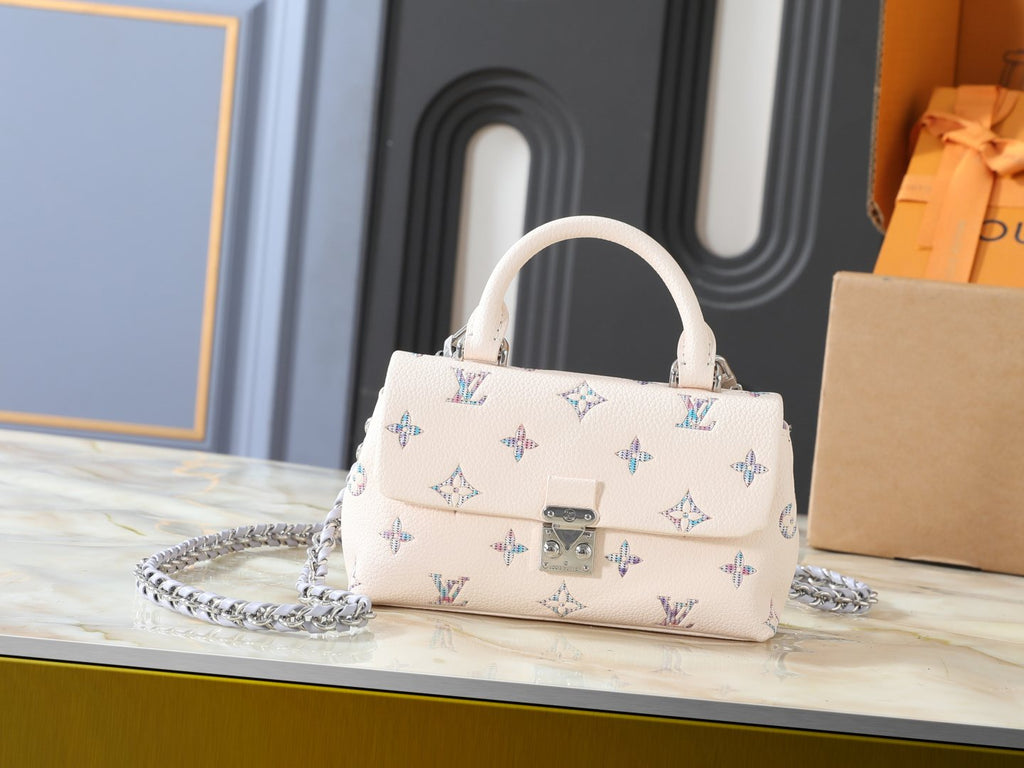 Louis Vuitton Nano Madeleine Monogram Top-Handle Bag — hero