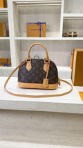 Louis Vuitton Domed Top-Handle Bag — hero