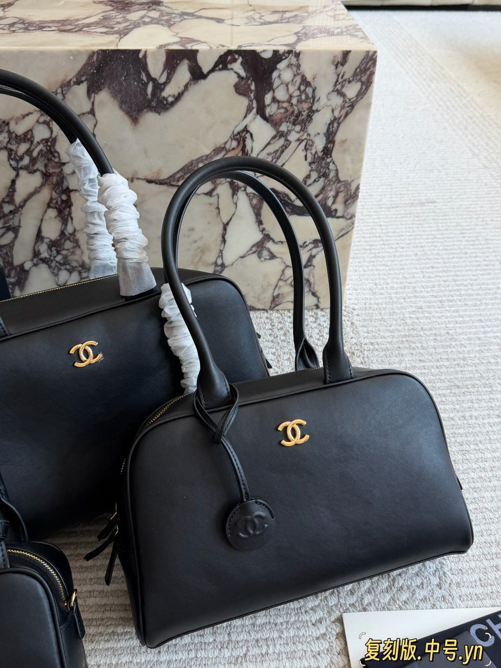 Chanel Black Bowling Bag with Round Charm — hero